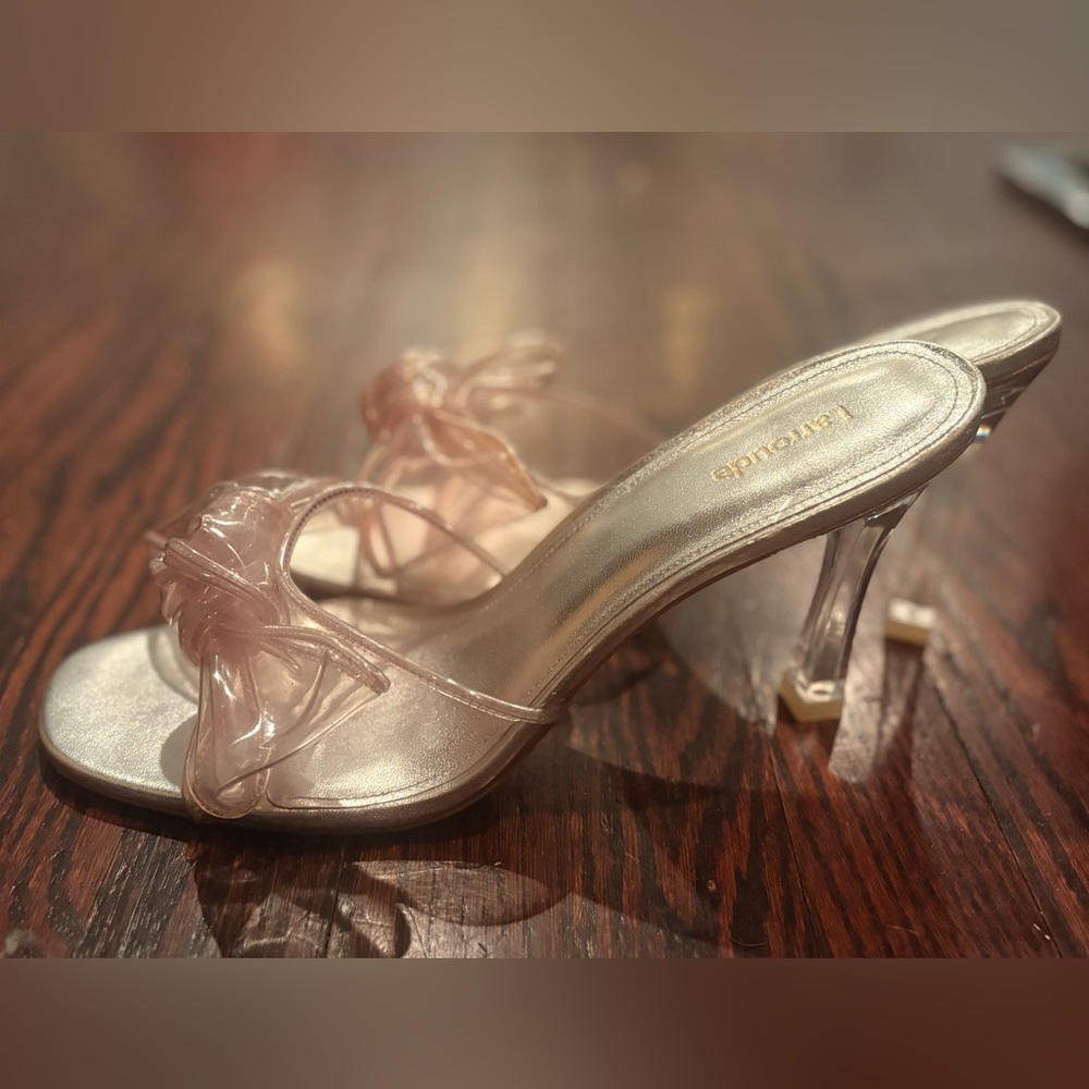 Larroude clear bow heels